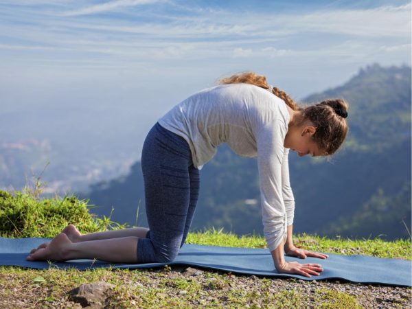 Yoga for Tight Hips: A Restful Cow Face Pose - YogaUOnline