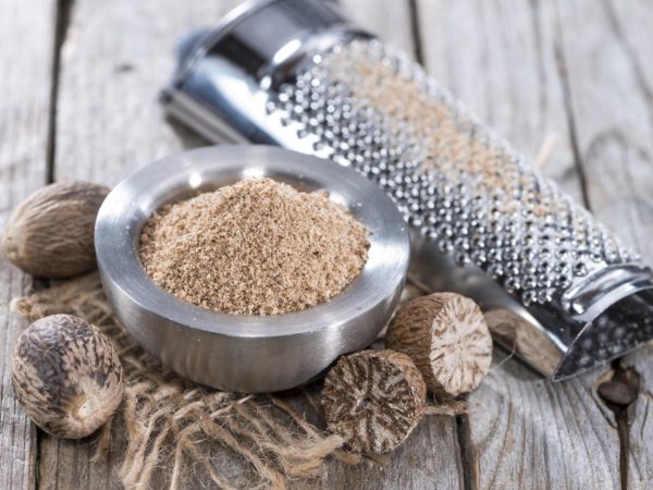 Small bowl with fresh grated Nutmeg Powder